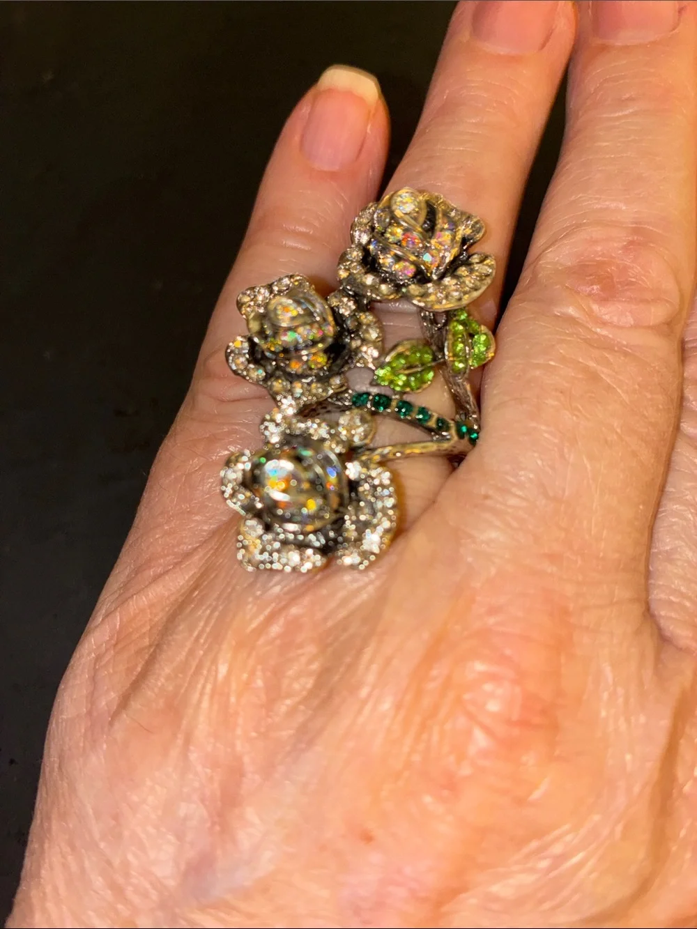 Featuring Three Crystal Rose Blooms Cocktail Stretch Ring with Green Accents